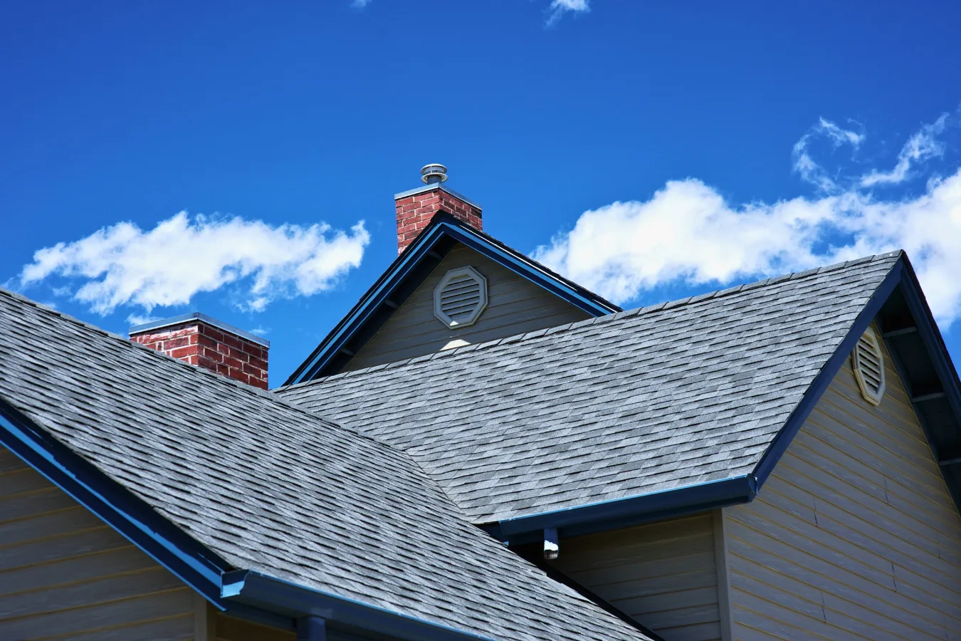 Well-maintained residential asphalt shingle roof after preventative maintenance service