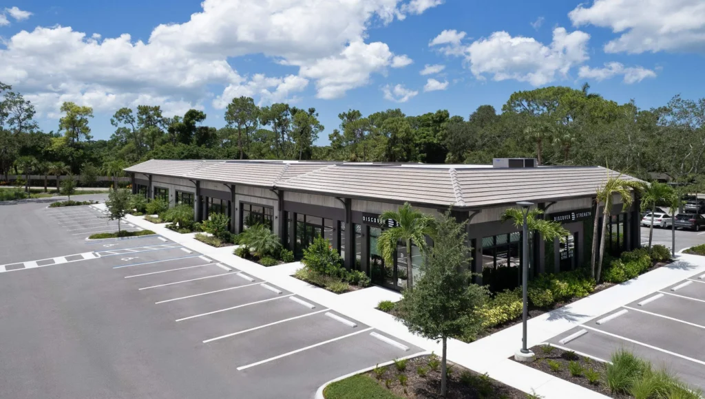 Completed TPO roofing system on the Starbucks building at Plaza Halstatt