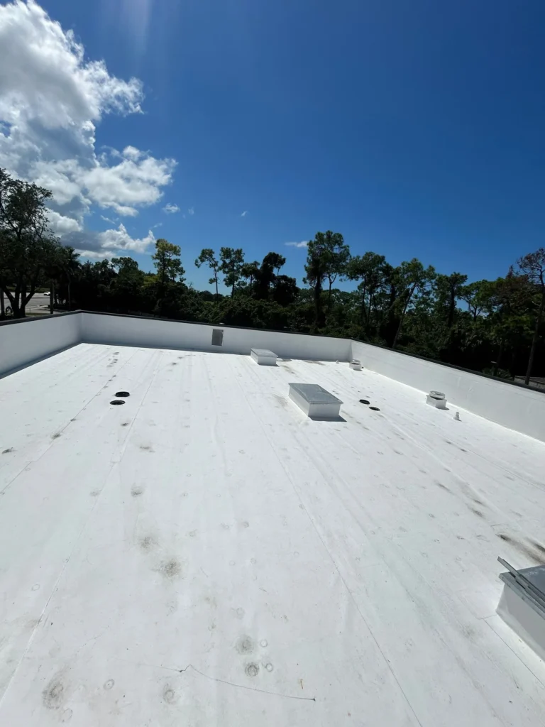 White TPO commercial roofing system at Plaza Halstatt